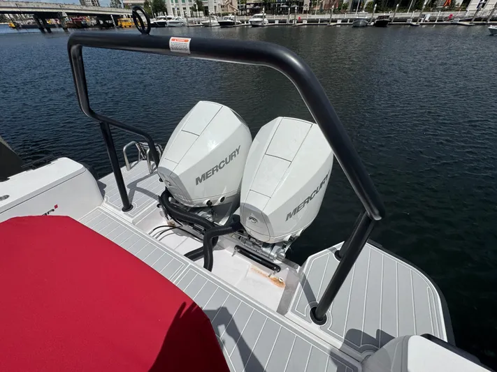  Yacht Photos Pics 2022 Axopar 28 T-top Aft Cabin with dual Mercury outboard engines.
