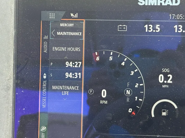  Yacht Photos Pics Simrad display showing engine hours and speed for 2022 Axopar 28 T-top Aft Cabin.