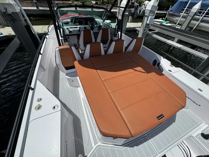  Yacht Photos Pics 2022 Axopar 28 T-top Aft Cabin Brabus Trim with tan seating, docked at marina.