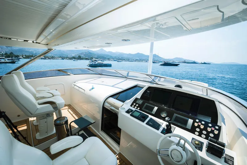  Yacht Photos Pics Luxurious Sunseeker 34 Metre Yacht 2011 cockpit with ocean view and modern controls.