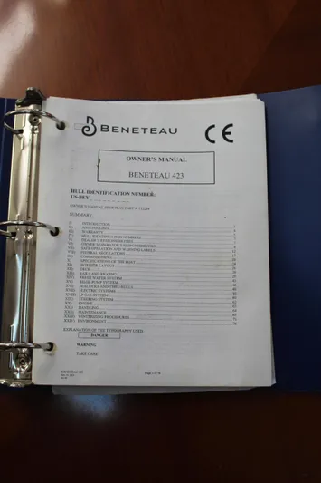 Coyote Yacht Photos Pics Owner's manual for 2004 Beneteau Oceanis Clipper 423 in a blue binder.