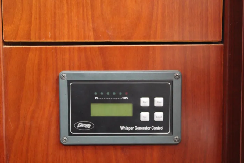 Coyote Yacht Photos Pics Whisper generator control panel on 2004 Beneteau Oceanis Clipper 423 yacht.