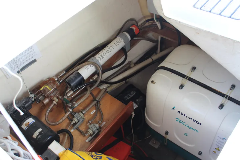 Coyote Yacht Photos Pics Engine compartment of a 2004 Beneteau Oceanis Clipper 423 sailboat.
