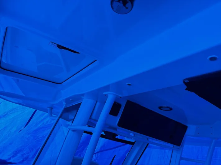  Yacht Photos Pics 2016 Boston Whaler 350 Outrage interior, featuring sleek design and modern amenities.