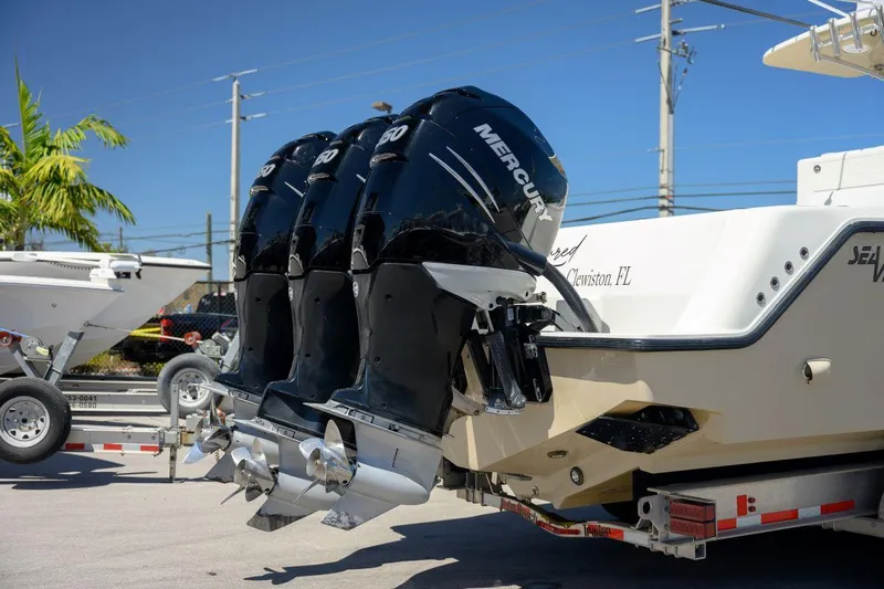  Yacht Photos Pics 2016 SeaVee 390Z boat with triple Mercury outboard engines on a trailer.