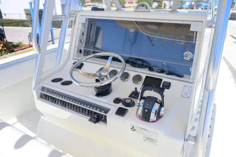  Yacht Photos Pics 2016 SeaVee 390Z boat dashboard with steering wheel and control panel.