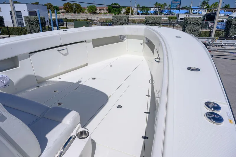  Yacht Photos Pics 2016 SeaVee 390Z boat deck with spacious seating and storage compartments.