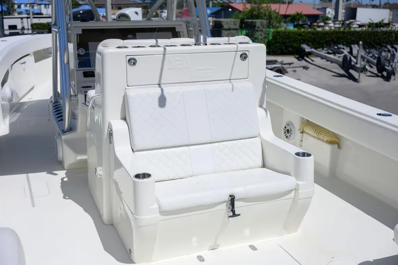  Yacht Photos Pics 2016 SeaVee 390Z boat with white cushioned seating and cup holders.