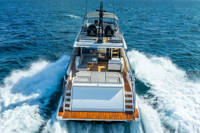  Yacht Photos Pics Luxury 2019 Azimut S7 yacht cruising on open sea, rear view.