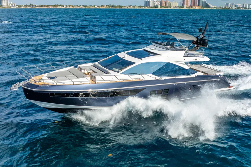  Yacht Photos Pics 2019 Azimut S7 yacht cruising on open blue ocean waters.