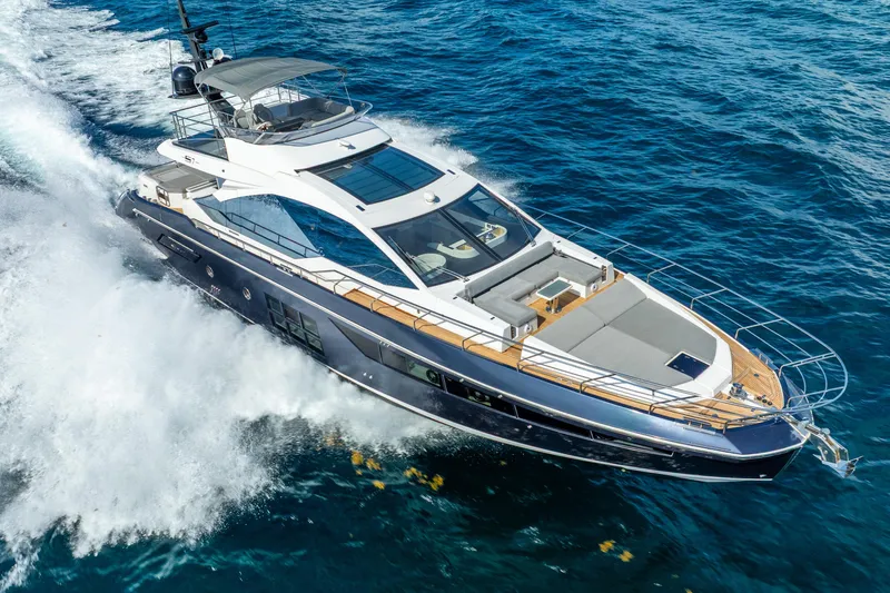  Yacht Photos Pics 2019 Azimut S7 yacht cruising on open sea, showcasing sleek design and luxury features.