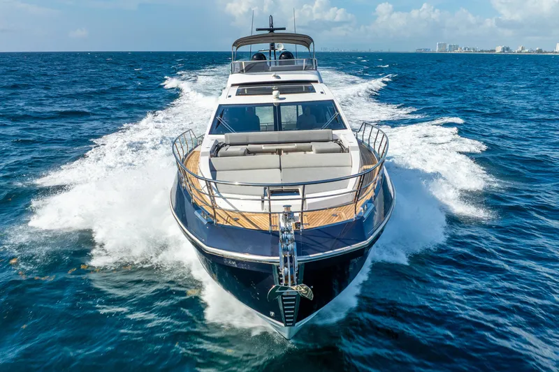  Yacht Photos Pics 2019 Azimut S7 yacht cruising on open blue ocean waters.