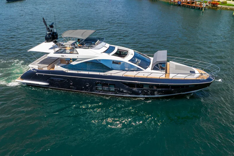  Yacht Photos Pics 2019 Azimut S7 yacht cruising on open water, showcasing sleek design and luxury features.