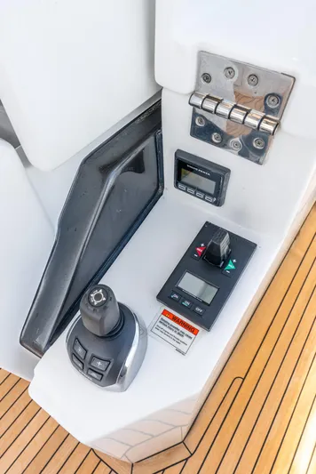  Yacht Photos Pics Control panel of 2019 Azimut S7 yacht with joystick and digital display.
