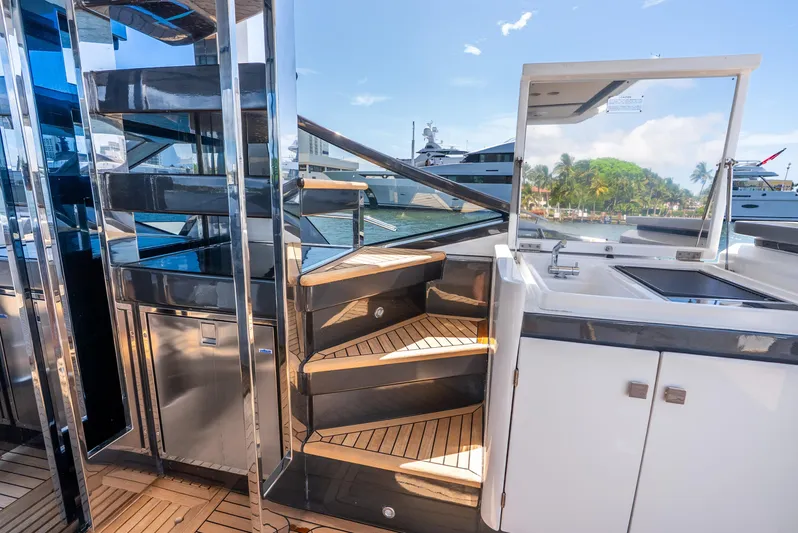  Yacht Photos Pics 2019 Azimut S7 yacht interior with sleek stairs and modern kitchenette.