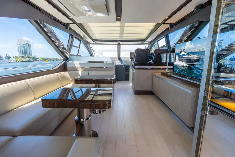  Yacht Photos Pics Luxurious interior of a 2019 Azimut S7 yacht with modern furnishings and panoramic windows.