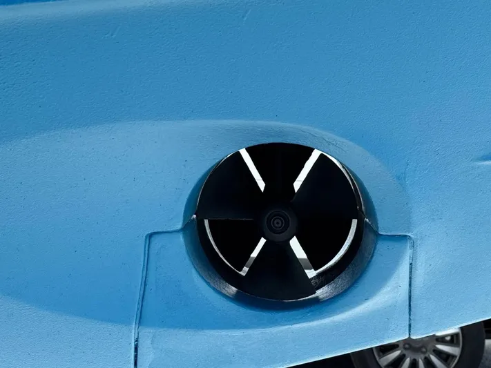 Ain't Settlin! Yacht Photos Pics Bow thruster of 2013 Prestige 550 Flybridge yacht in blue hull.