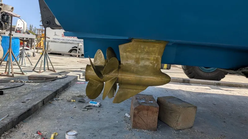 Ain't Settlin! Yacht Photos Pics Propeller of 2013 Prestige 550 Flybridge yacht on dry dock.