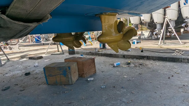 Ain't Settlin! Yacht Photos Pics Underwater view of 2013 Prestige 550 Flybridge propellers in a boatyard.