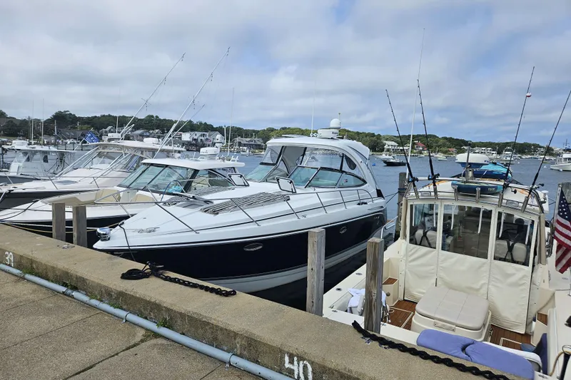 Sea Wolf Yacht Photos Pics 2010 Formula 34 Performance Cruiser docked at a marina with other boats.
