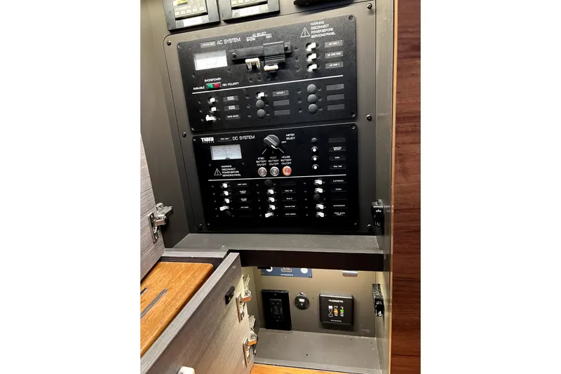 Yacht Photos Pics Electrical control panel of a 2019 Tiara Sport 34 LS boat, featuring AC and DC systems.