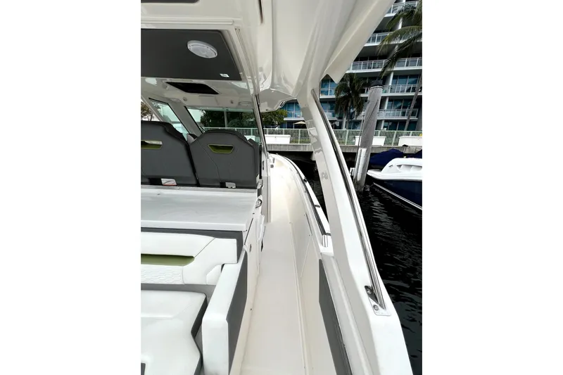  Yacht Photos Pics 2019 Tiara Sport 34 LS boat interior with sleek seating and modern design.