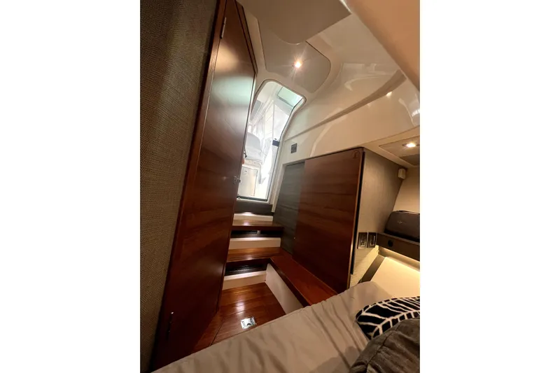  Yacht Photos Pics Interior of 2019 Tiara Sport 34 LS boat with wooden stairs and modern design.