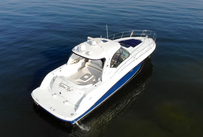 Debra Lee Yacht Photos Pics 2006 Sea Ray 44 Sundancer yacht on calm water, aerial view.