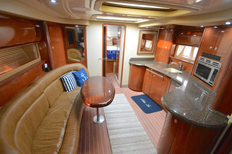 Debra Lee Yacht Photos Pics Luxurious interior of 2006 Sea Ray 44 Sundancer yacht with elegant wood finishes.