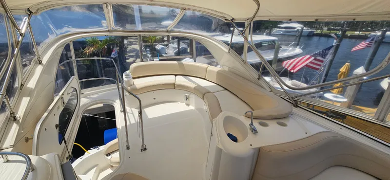 Yacht Photos Pics 2013 Meridian 391 Sedan yacht interior with plush seating and marina view.