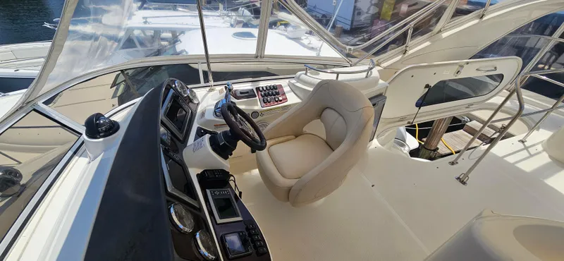  Yacht Photos Pics 2013 Meridian 391 Sedan helm with modern controls and comfortable seating.