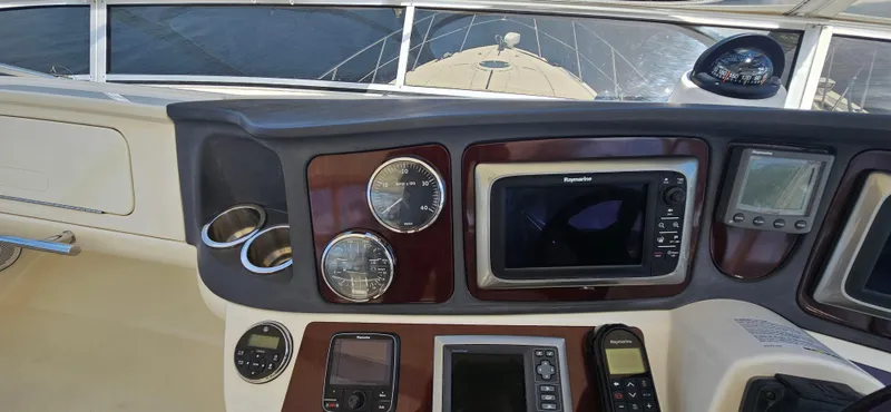  Yacht Photos Pics Control panel of a 2013 Meridian 391 Sedan yacht with navigation instruments.