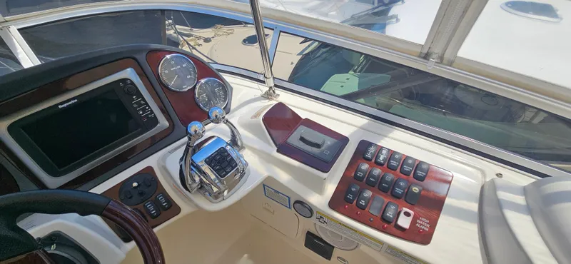  Yacht Photos Pics Helm of 2013 Meridian 391 Sedan with navigation controls and gauges.