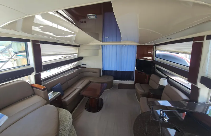  Yacht Photos Pics Luxurious interior of a 2013 Meridian 391 Sedan yacht with elegant seating and modern design.