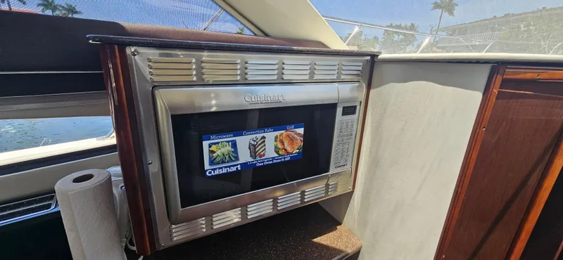  Yacht Photos Pics Cuisinart microwave in 2013 Meridian 391 Sedan yacht kitchen interior.