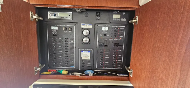  Yacht Photos Pics Electrical panel inside a 2013 Meridian 391 Sedan yacht cabinet.