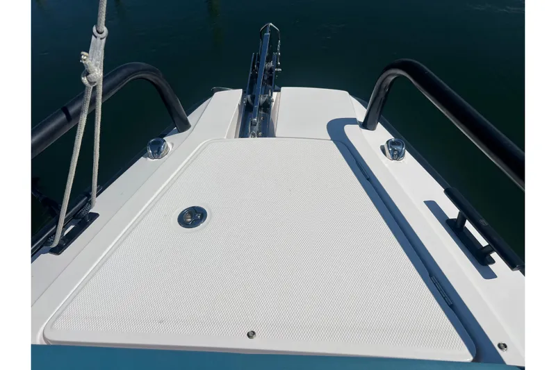  Yacht Photos Pics Bow of 2021 Axopar 28 boat with sleek design and sturdy railings.
