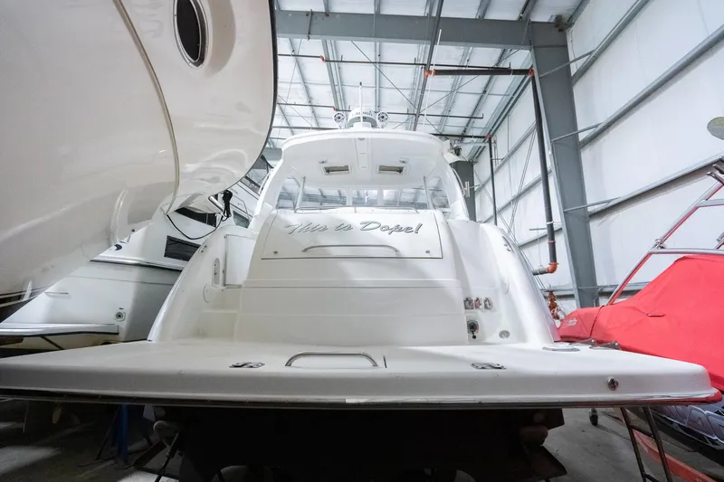 This Is Dope Yacht Photos Pics 2005 Formula 40 Cruiser yacht in storage, rear view in a boatyard.