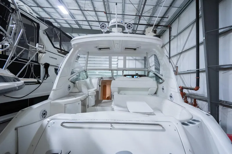 This Is Dope Yacht Photos Pics 2005 Formula 40 Cruiser in a storage facility, showcasing sleek design and spacious interior.