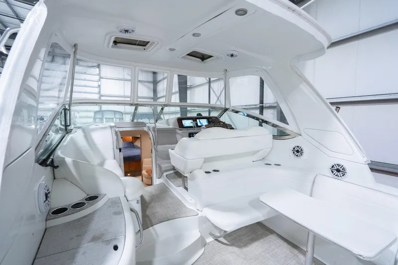 This Is Dope Yacht Photos Pics 2005 Formula 40 Cruiser interior with modern seating and navigation area.