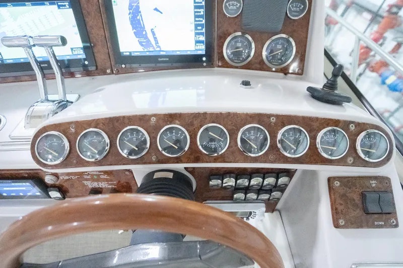 This Is Dope Yacht Photos Pics 2005 Formula 40 Cruiser dashboard with gauges, controls, and navigation screens.