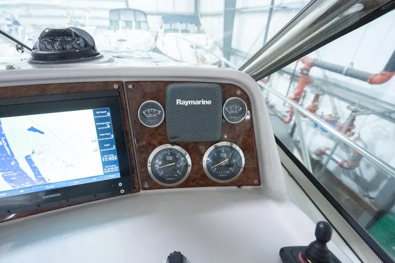 This Is Dope Yacht Photos Pics Control panel of a 2005 Formula 40 Cruiser with navigation instruments and display.