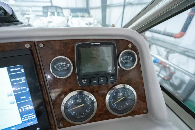 This Is Dope Yacht Photos Pics Dashboard of a 2005 Formula 40 Cruiser with gauges and navigation display.
