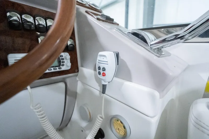 This Is Dope Yacht Photos Pics 2005 Formula 40 Cruiser helm with controls and steering wheel detail.