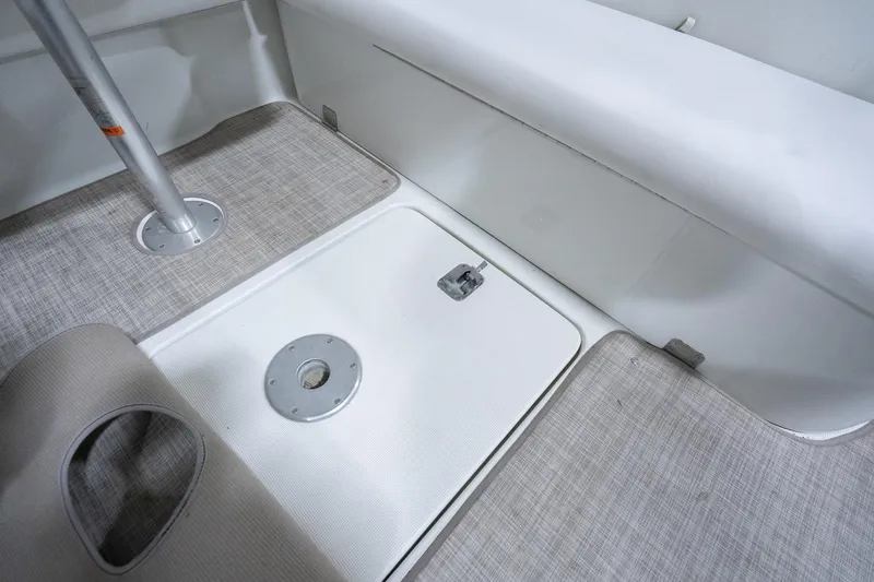 This Is Dope Yacht Photos Pics 2005 Formula 40 Cruiser interior with carpeted flooring and seating area.