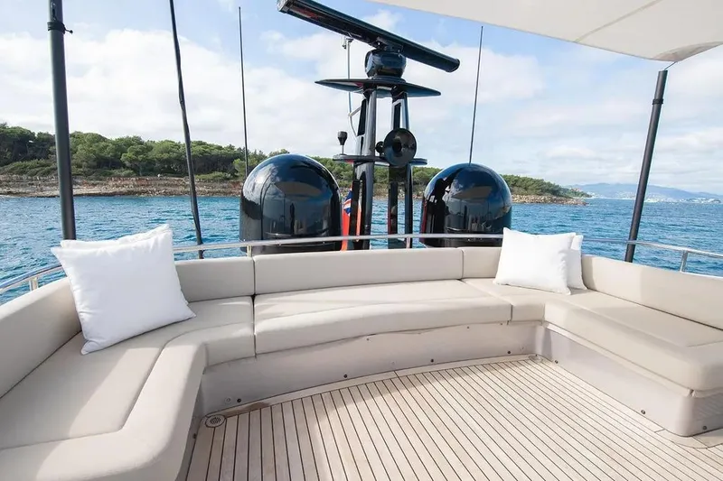  Yacht Photos Pics Luxurious 2021 Pershing 9X yacht deck with elegant seating and ocean view.