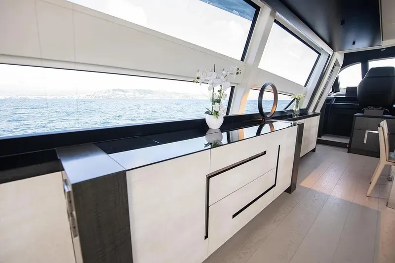  Yacht Photos Pics Luxurious interior of 2021 Pershing 9X yacht with modern design and ocean view.