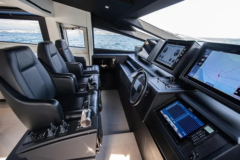  Yacht Photos Pics Luxurious 2021 Pershing 9X yacht cockpit with advanced navigation systems and leather seating.