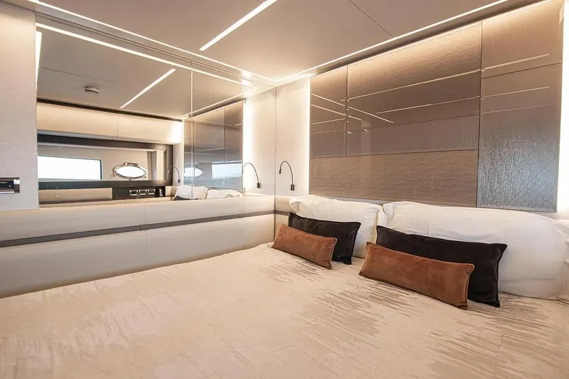  Yacht Photos Pics Luxurious bedroom interior of 2021 Pershing 9X yacht with modern design and elegant decor.