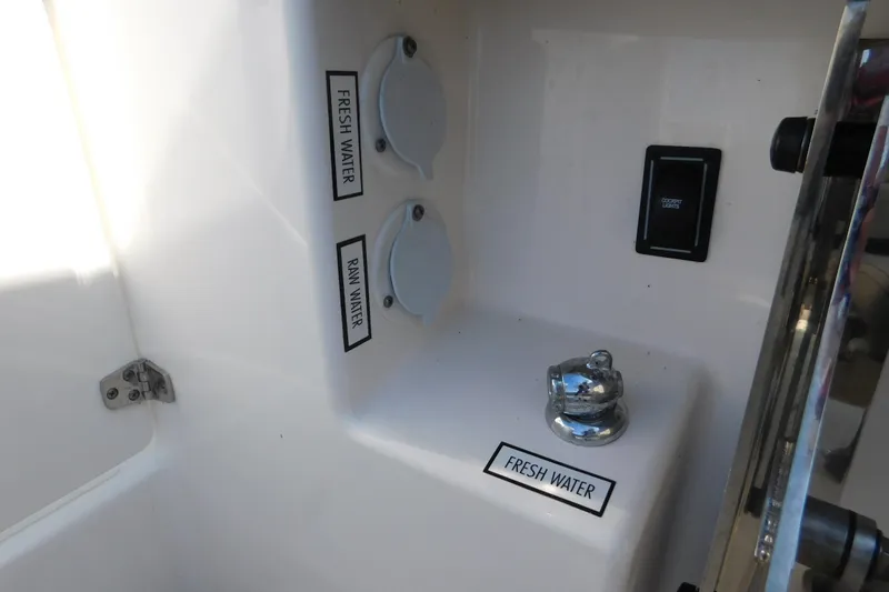  Yacht Photos Pics 2024 Pursuit DC 326 Dual Console water controls and faucet detail.